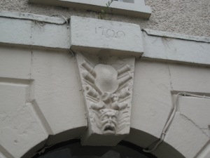 The keystone above the entrance of the old barracks.